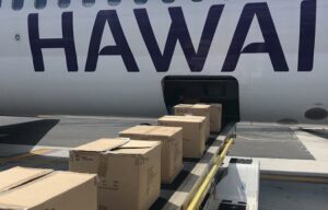 1,600 amenity kits being loaded onto aircraft to be distributed to those displaced by the Maui fires.