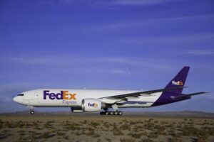 FedEx profits improve as cost cutting takes effect